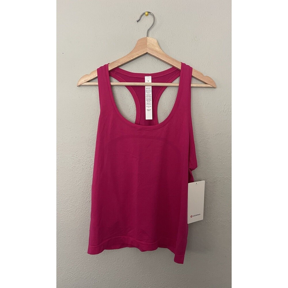 Lululemon pink swiftly tech size 12 cropped Racer back tank